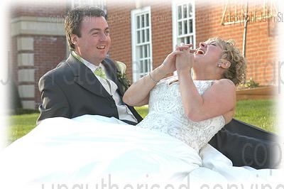 groom and bride laughing - Manor Hotel Meriden, Solihull wedding video wedding photography